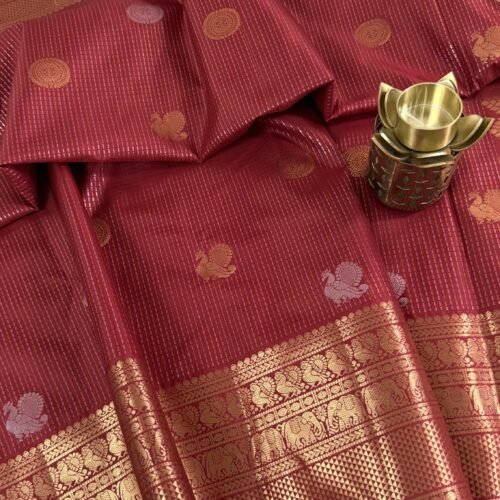 deep maroon vintage kanchi pattu saree with gold zari weaving and elephant border