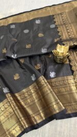 black vintage kanchi pattu saree with gold zari weaving and elephant border