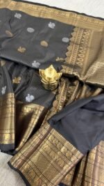 black vintage kanchi pattu saree with gold zari weaving and elephant border