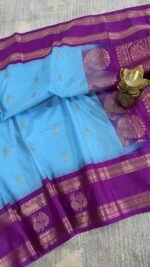 sky blue semi gadwal saree with purple contrast zari border and traditional weaving