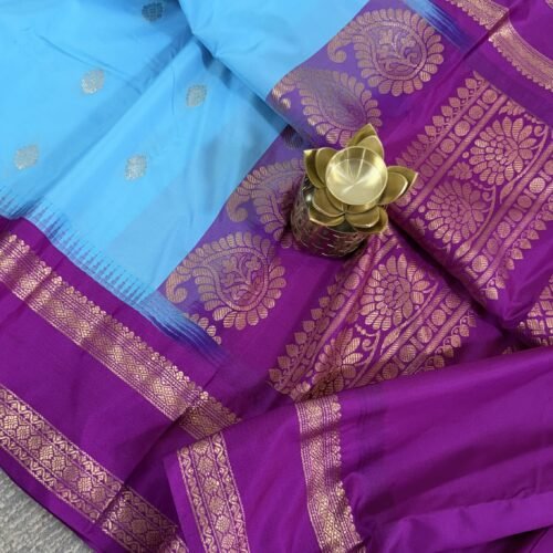 sky blue semi gadwal saree with purple contrast zari border and traditional weaving