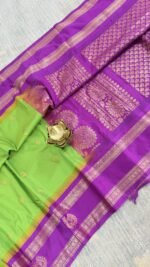 lime green semi gadwal saree with purple zari border and traditional weaving