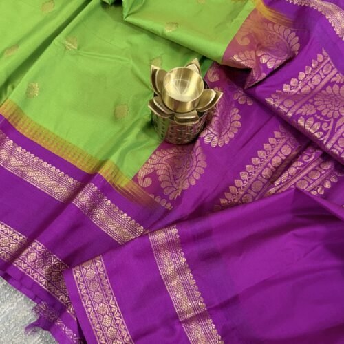lime green semi gadwal saree with purple zari border and traditional weaving