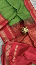 green semi gadwal saree with red contrast zari border and rich pallu