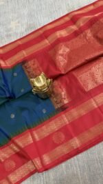 teal blue semi gadwal saree with rust orange zari border and traditional weaving