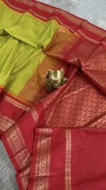 lime green semi gadwal saree with red contrast zari border and traditional weaving