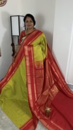 lime green semi gadwal saree with red contrast zari border and traditional weaving