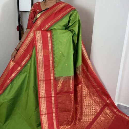 lime green semi gadwal saree with red contrast zari border and traditional weaving