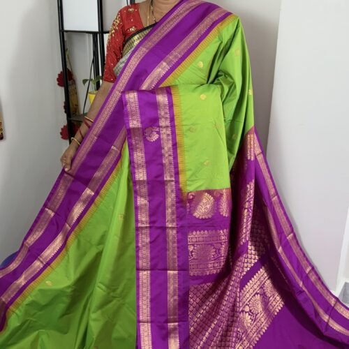 lime green semi gadwal saree with purple zari border and traditional weaving