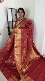 deep maroon vintage kanchi pattu saree with gold zari weaving and elephant border