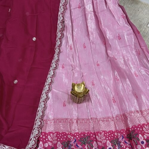 baby pink and rani pastel half saree with kanchi tissue lehenga and peacock border