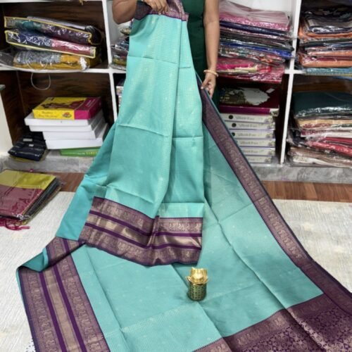Aqua Blue Semi Gadwal Silk Saree with Purple Contrast Border by SASU Fashions